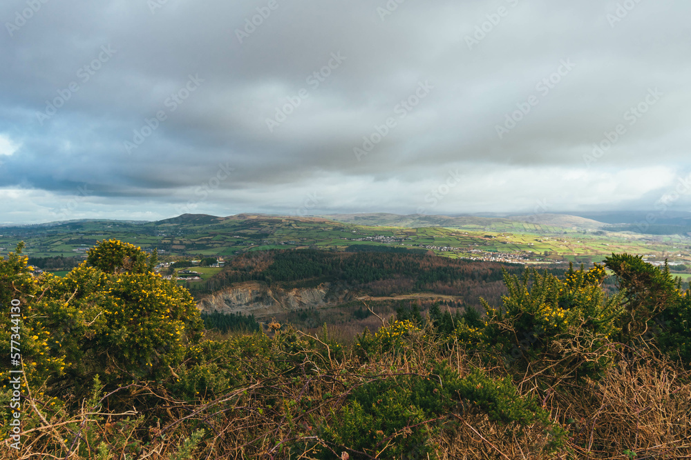Grey cloudy sky, with rolling green hills and vegetation, Slieve Gullion, Co. Armagh,  Ring of Gullion, Northern Ireland