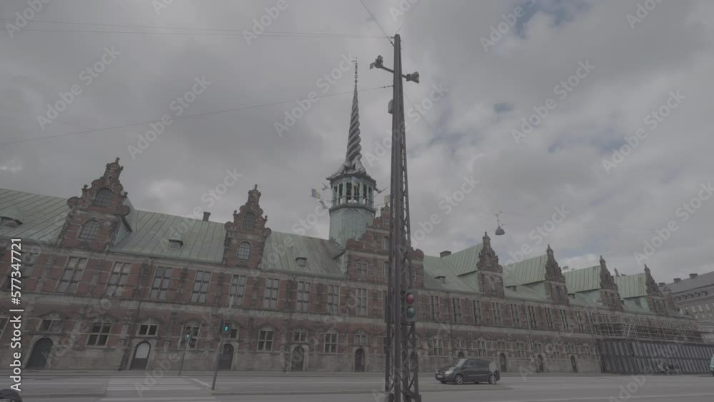 Shot of the Borson building in Copenhagen filmed from below on a cloudy day LOG