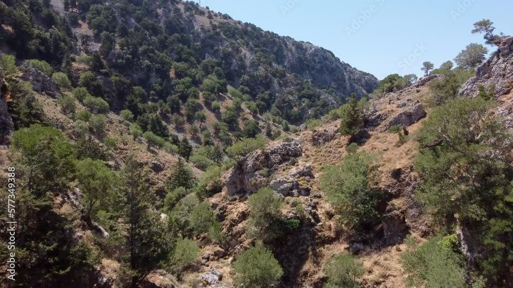 Scenic drone flight up Imbros Gorge with sparse vegetation in Crete, Greece Scenic drone flight up Imbros Gorge with sparse vegetation in Crete, Greece