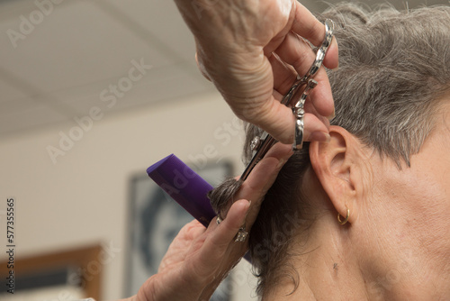 Closeup of Stylist Trimming Hair