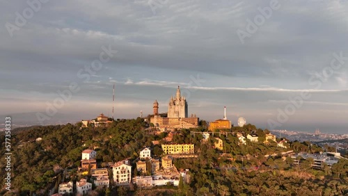 Wallpaper Mural Church on summit of Mount Tibidabo in Barcelona, Catalonia, Spain. Aerial forward ascending and sky for copy space Torontodigital.ca