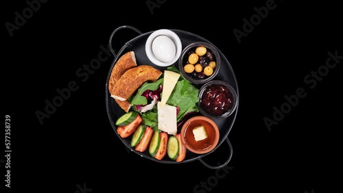breakfast plate on isolated black background