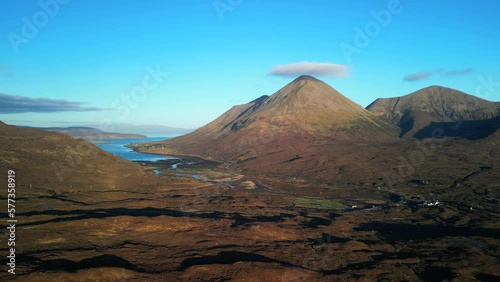 Pan across Sligachan and Red Cuillin Glamaig with cloud top on the Isle of Skye Scotland photo