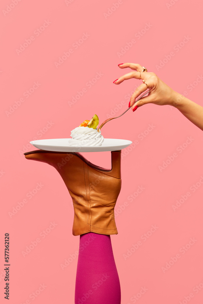 Creativity, art. Delicious dessert, meringue on plate on female legs, boots against pink studio background. Food pop art photography. Complementary colors. Copy space for ad, text - obrazy, fototapety, plakaty 
