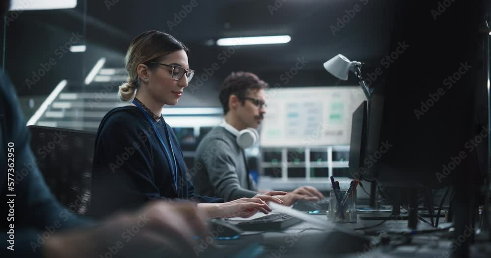 Portrait of a Thoughtful Young Engineer Working on Computer in a ...