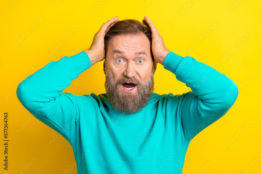 Photo of stressed depressed man wear trendy clothes shocked negative information accident isolated on yellow color background Photo of stressed depressed man wear trendy clothes shocked negative information accident isolated on yellow color background