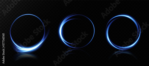 Magic portals on the night scene. Blue round holograms with rays of light and sparkles. Glowing futuristic teleport tunnel with copy space on black background.
