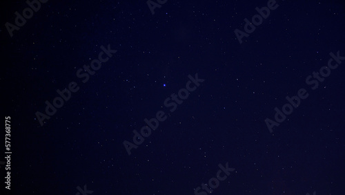 Many different stars and constellations in the night blue sky in summer 