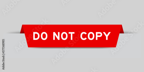 Red color inserted label with word do not copy on gray background