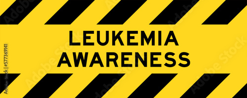 Yellow and black color with line striped label banner with word leukemia awareness