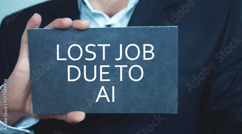 Man showing message Lost Job Due To Artificial Intelligence.