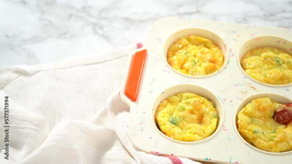 Step by step. Cooling fresh out of the oven bacon and cheese egg muffin. Step by step. Cooling fresh out of the oven bacon and cheese egg muffin.