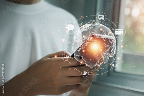 Mobile banking network, online payment, digital marketing. Using mobile phone with paying via mobile banking app with icon network connection on virtual screen. Financial Technology.