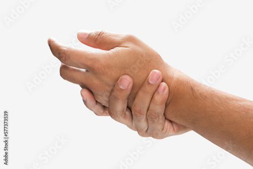 A man grab hand palm because the hand palm was injured. Hand pain. On a gray background. photo