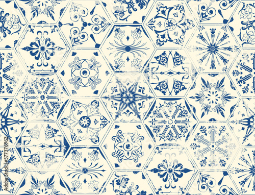 Seamless vintage pattern with an effect of attrition. Patchwork carpet. Hand drawn seamless abstract pattern from tiles. Azulejos tiles patchwork. Portuguese and Spain decor in blue and white.