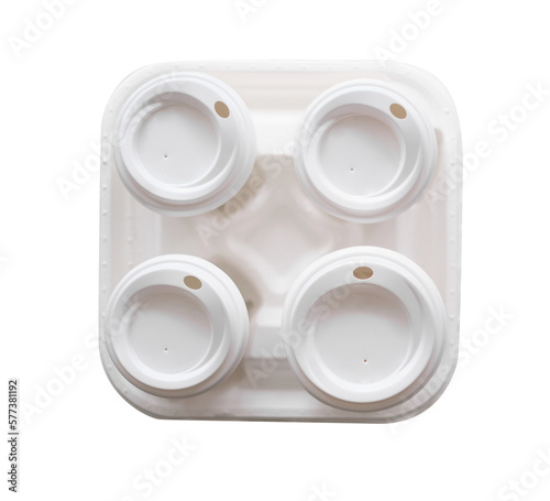 mockup of four cardboard white cups for hot drinks in a holder top view