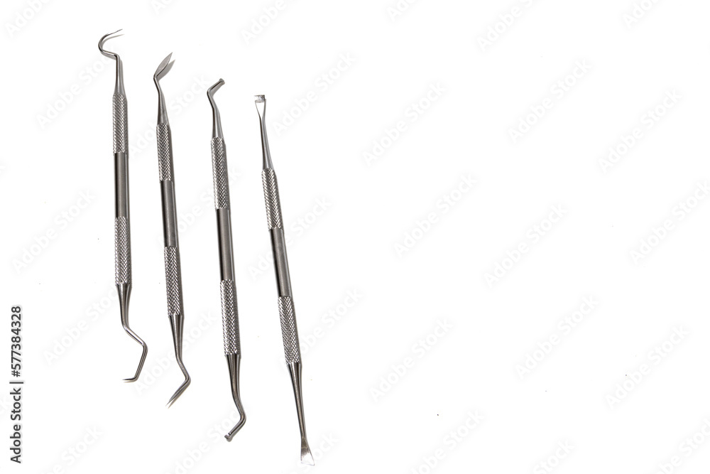 Dental tool, isolated on a white background. Concept of materials of a dental clinic. Dental tool, isolated on a white background. Concept of materials of a dental clinic.
