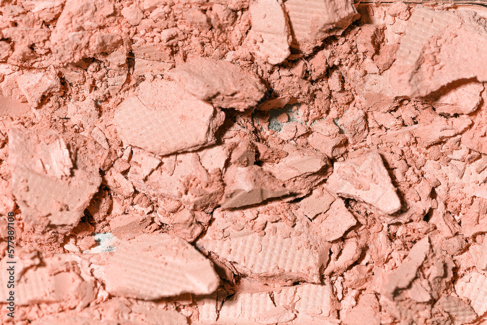 Makeup eyeshadow background. Cosmetic texture, bronze. Macro shot. Beauty concept.