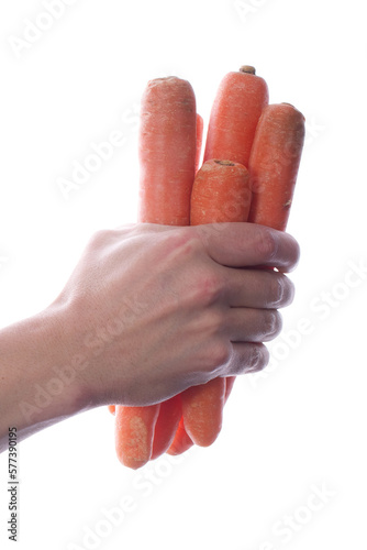 Strong fit muscular male holding carrots in his right hand close up transparent PNG
