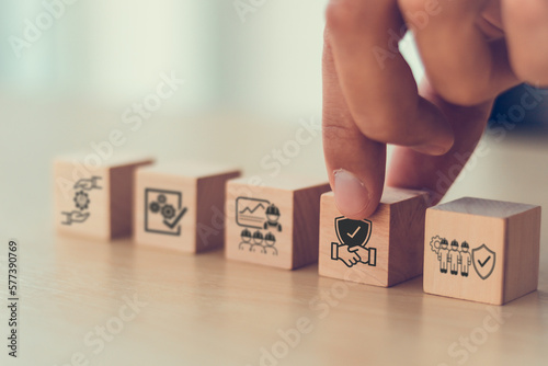 Work safety concept. Safety at workplace and compliance icons on wooden cube blocks. Working standard processes. Zero accidents. Using for safety awareness banner.