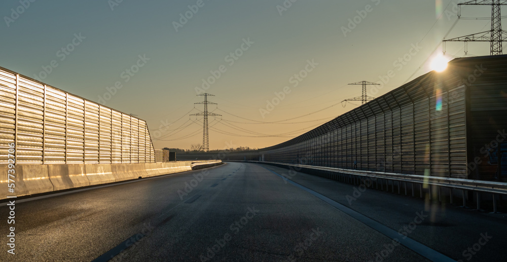Noise protection walls at a empty German Autobahn.