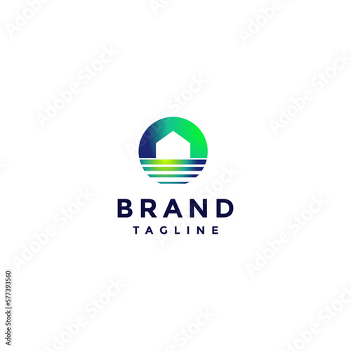 Home Icon Silhouette Inside Circle Symbol Logo Design. Circle Symbol With House Icon And Waterlines Inside Logo Design.