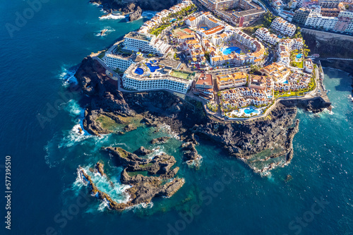 Aerial view above the resorts on the coast in Tenerife at Los Gigantes photo