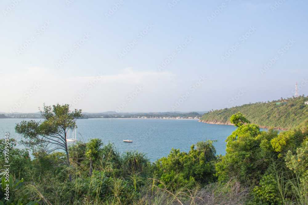 Beautiful view of the tropical beach of Sri Lanka on a sunny day Beautiful view of the tropical beach of Sri Lanka on a sunny day