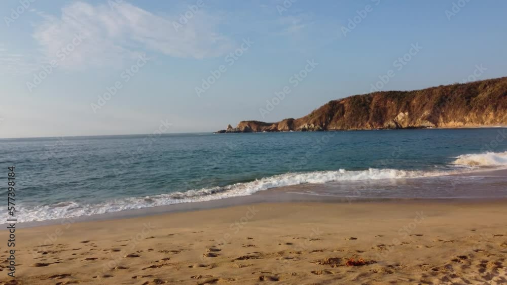Sun-kissed sand dunes and frothy ocean waves, a heavenly combination. Sun-kissed sand dunes and frothy ocean waves, a heavenly combination.