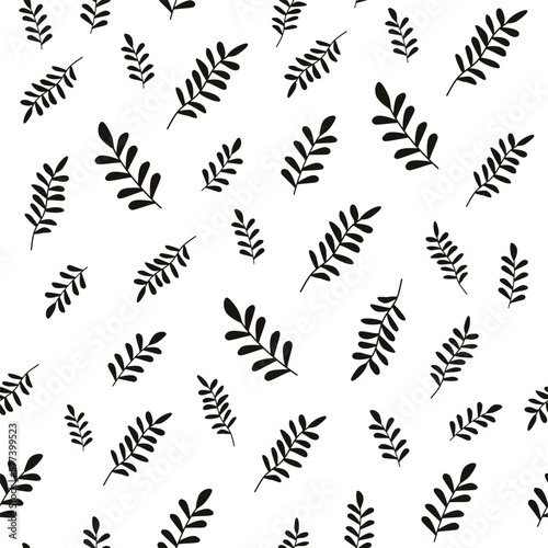 Seamless pattern with leaves in monochrome black color