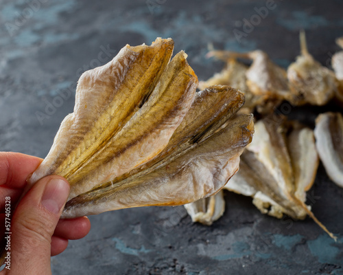 Salted dried horse mackerel, yellow minke fish. Fish appetizer for beer photo