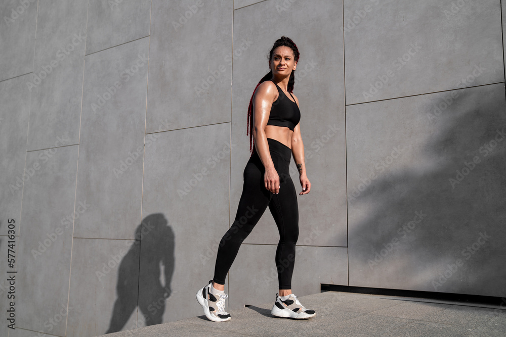 Fitness portrait, exercise and happy woman at gym for a workout, training and body motivation at health club. Face of sports or athlete female happy about performance, progress and healthy lifestyle Fitness portrait, exercise and happy woman at gym for a workout, training and body motivation at health club. Face of sports or athlete female happy about performance, progress and healthy lifestyle