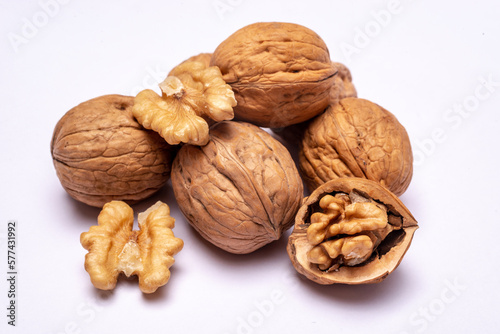 walnuts on white background © Neelutpal