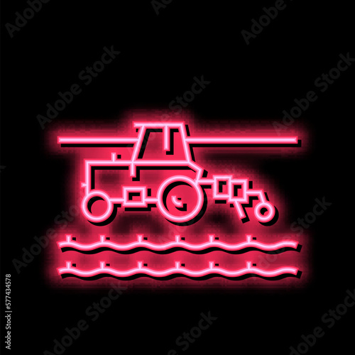 tractor cultivating field neon glow icon illustration