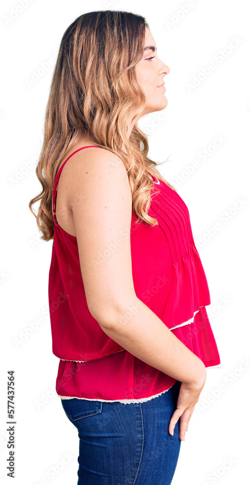 Young caucasian woman wearing casual clothes looking to side, relax profile pose with natural face with confident smile. Young caucasian woman wearing casual clothes looking to side, relax profile pose with natural face with confident smile.