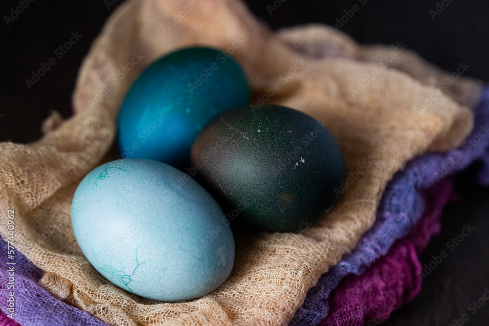 Easter. Natural dyed eggs and cheese cloths. Close up Easter. Natural dyed eggs and cheese cloths. Close up