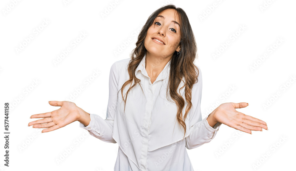Young brunette woman wearing casual clothes clueless and confused expression with arms and hands raised. doubt concept. Young brunette woman wearing casual clothes clueless and confused expression with arms and hands raised. doubt concept.