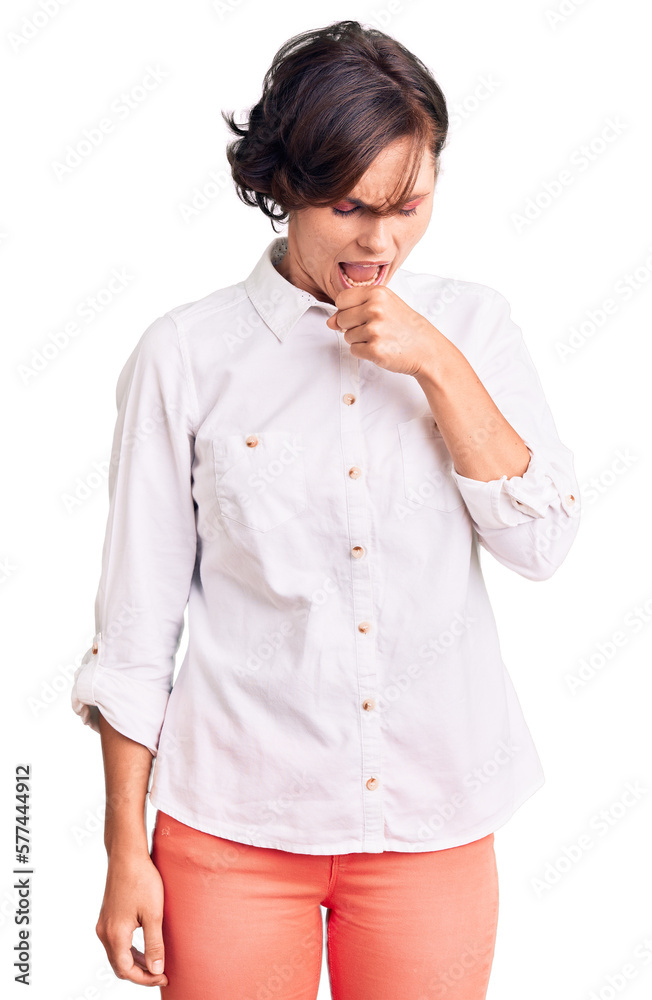 Beautiful young woman with short hair wearing elegant white shirt feeling unwell and coughing as symptom for cold or bronchitis. health care concept. Beautiful young woman with short hair wearing elegant white shirt feeling unwell and coughing as symptom for cold or bronchitis. health care concept.