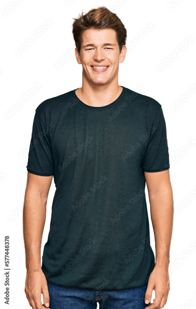 Handsome caucasian man wearing casual clothes with a happy and cool smile on face. lucky person. Handsome caucasian man wearing casual clothes with a happy and cool smile on face. lucky person.