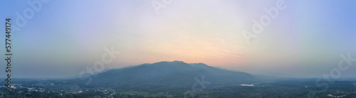 Aerial view in Chiang Mai of forest at sunrise. Drone shot flying over treetops, autumn forest , Flight over woods, nature background
