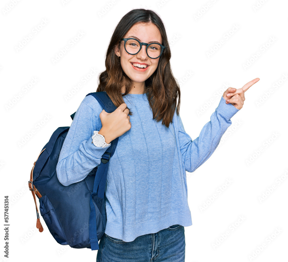 Young beautiful girl wearing student backpack smiling happy pointing with hand and finger to the side Young beautiful girl wearing student backpack smiling happy pointing with hand and finger to the side