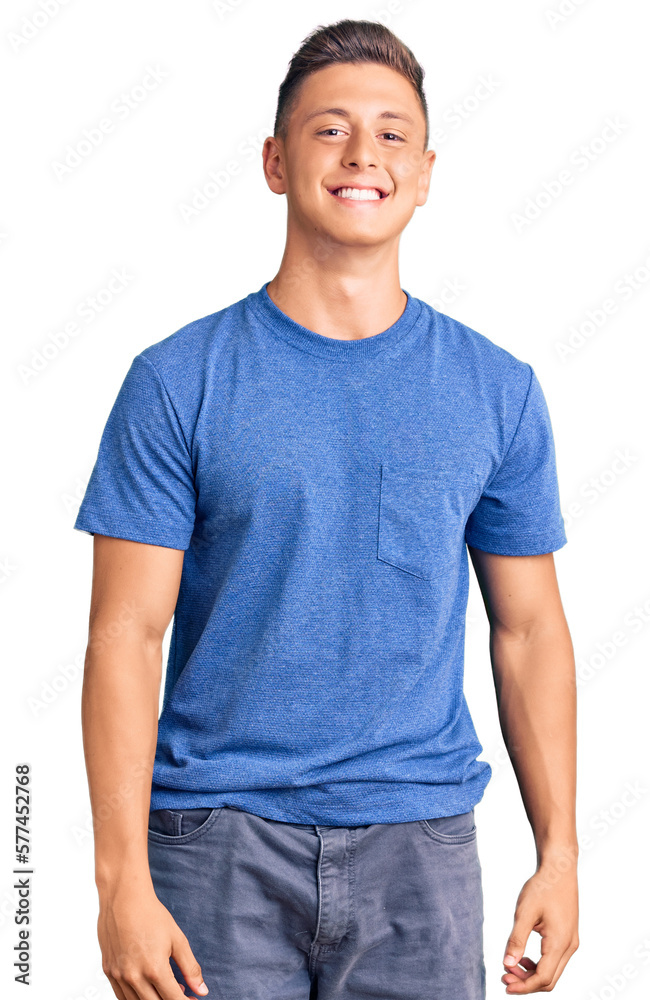 Young handsome hispanic man wearing casual clothes looking positive and happy standing and smiling with a confident smile showing teeth Young handsome hispanic man wearing casual clothes looking positive and happy standing and smiling with a confident smile showing teeth