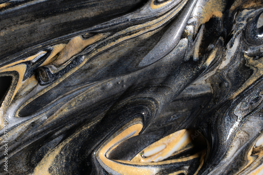 Golden and silver pigment in black dye Golden and silver pigment in black dye