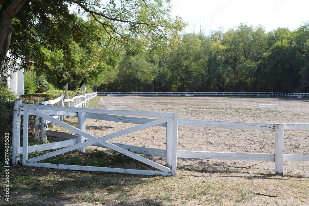 Beautiful photo of empty equestrian field for horse training