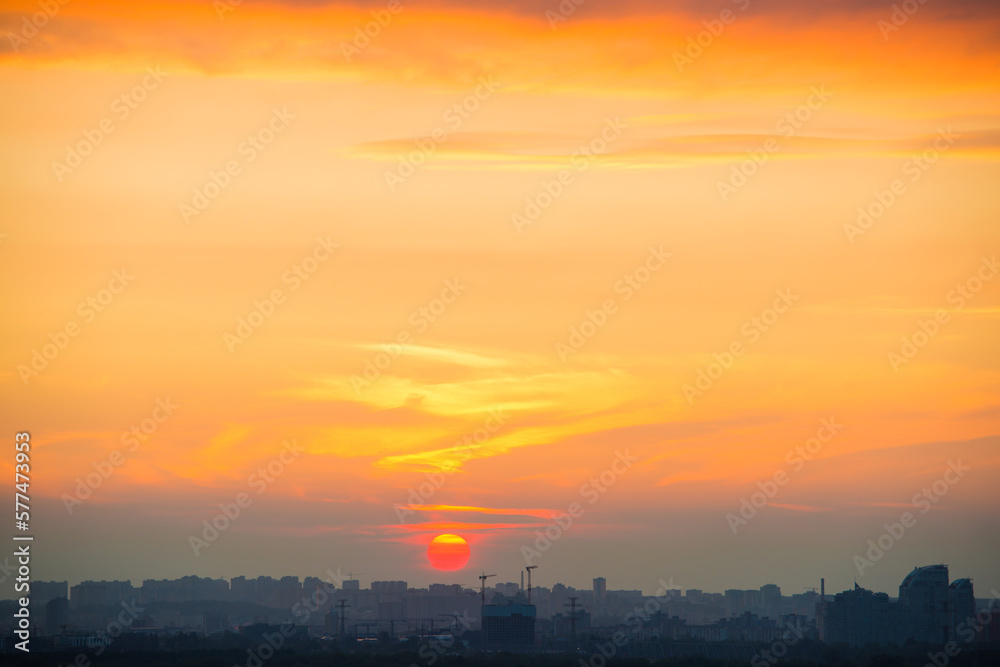 Sunset sky with sunset clouds on sunset sky. Kyiv city, Ukraine