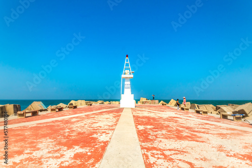lighthouse on the beach in sunny day, miramar beach in madero tamaulipas  photo