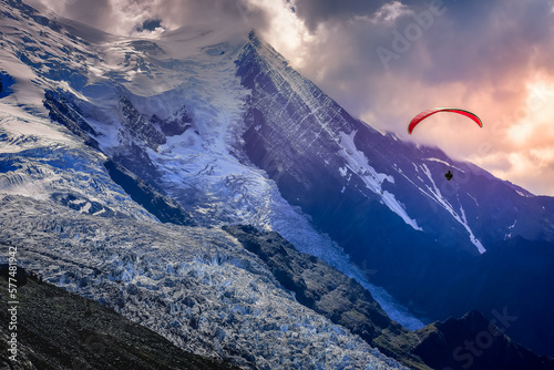 Paragliding above Mont Blanc massif alpine landscape , Chamonix, French Alps