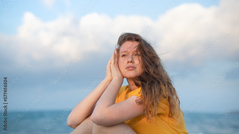 Portrait of happy girl, young carefree woman enjoying summer vacation on sea, walking on beach sand, smiling and having fun in tropical country, relaxing on nature. Summertime, happiness concept.