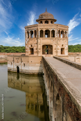 The picturesque Hiran Minar in Sheikhupura, Pakistan, is a UNESCO World Heritage Site, where the delicate minaret and serene lake blend together to form a truly captivating vista. photo