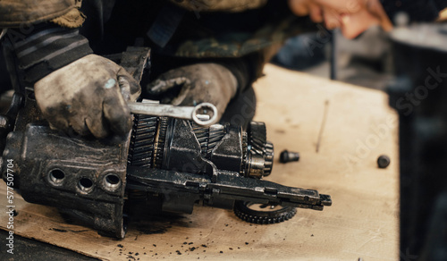 repair of gears and gearbox bearings in a car service.